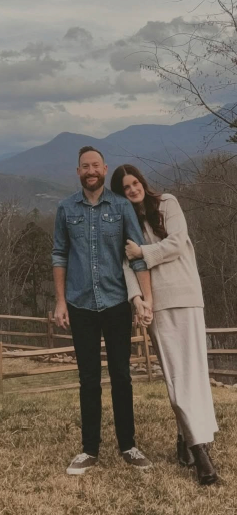 Austin Huskey with his wife, Kat, in a photo shared in December 2025.