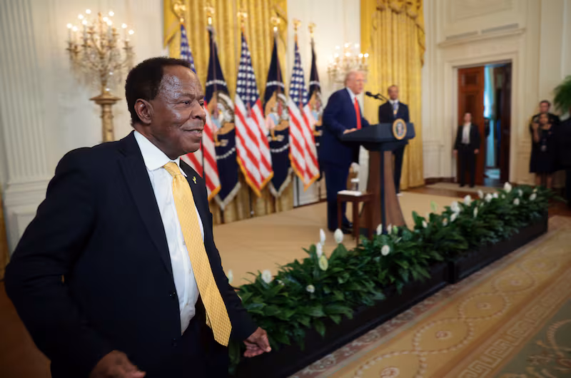 Civil rights attorney Leo Terrell leaves the stage after speaking alongside U.S. President Donald Trump and golf legend Tiger Woods during a reception honoring Black History Month in the East Room of the White House on Feb. 20, 2025 in Washington, D.C.