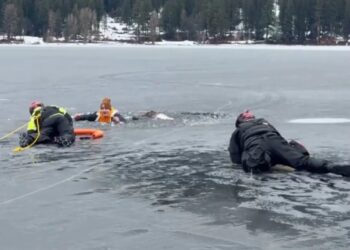 Washington man falls through ice into frigid lake — right in front of cops practicing water rescues