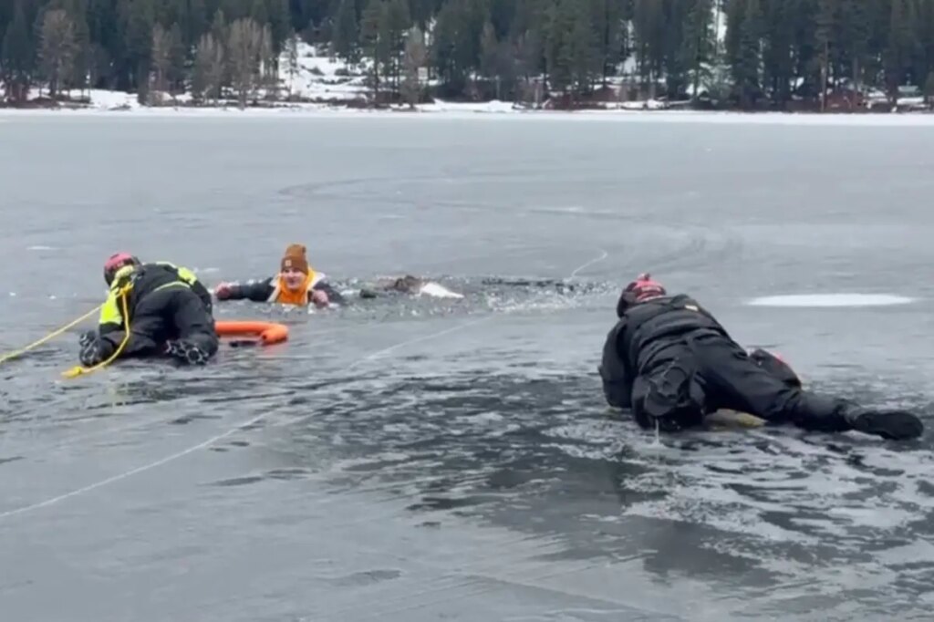 Washington man falls through ice into frigid lake — right in front of cops practicing water rescues