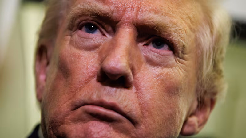 IN FLIGHT - FEBRUARY 06: U.S. President Donald Trump gaggles with reporters while aboard Air Force One on February 6, 2026 en route to Palm Beach, Florida. The President is spending the weekend at Mar-a-Lago, his private club. (Photo by Samuel Corum/Getty Images)