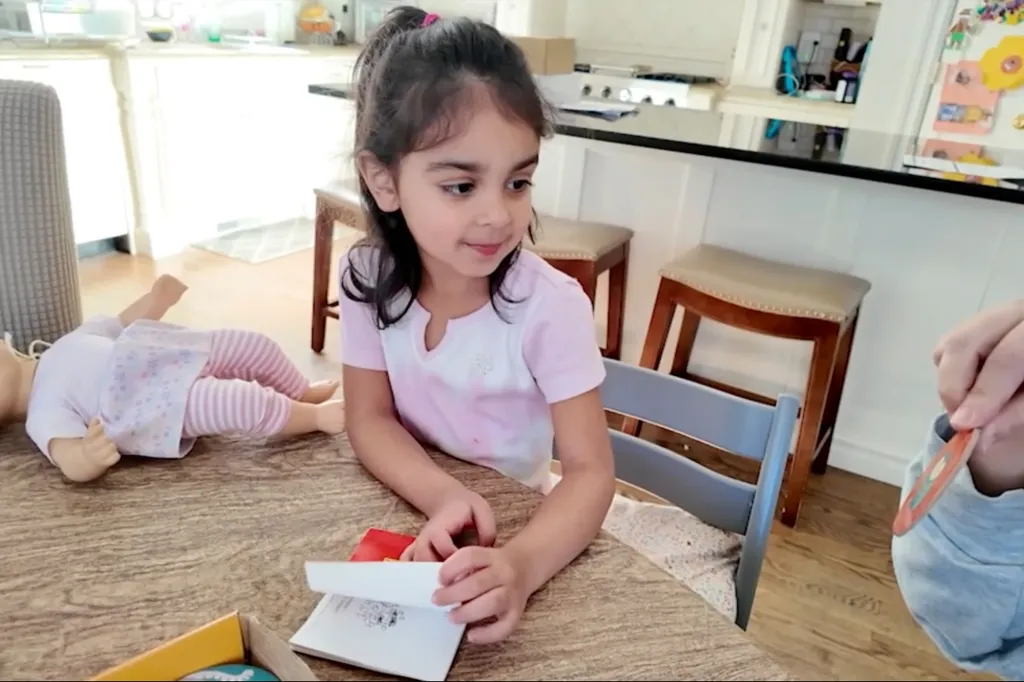 Zara Ibrahimi, 4, is just starting to read on her own. Her favorite color is pink, so she dresses accordingly from head to toe and was called for jury duty in early February.