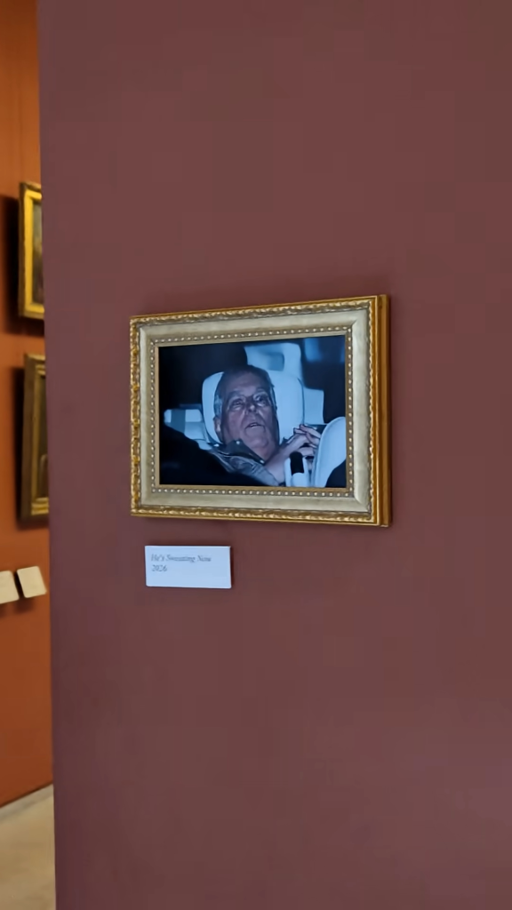 The photo was on display for reportedly 15 minutes before staff took it down.