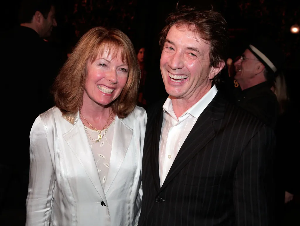 Nancy Dolman and Martin Short smiling at the