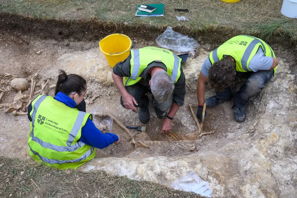 Archaeologists excavating skeletons believed to be from the 9th-century AD.