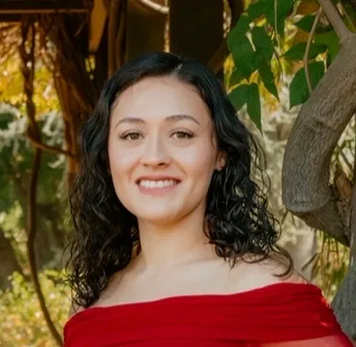 Alexus Villanueva smiling.