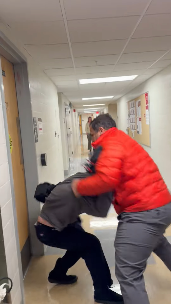 The two men wrestled to the ground during the brawl.