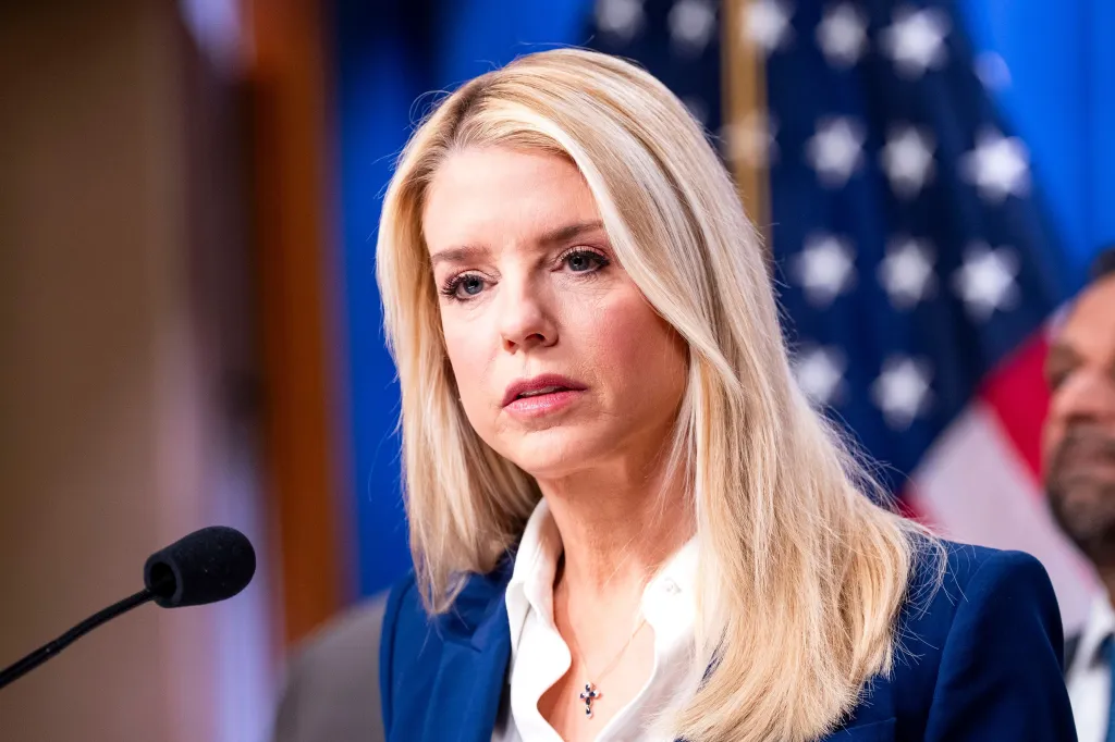 Attorney General Pam Bondi speaking at the Department of Justice Headquarters.