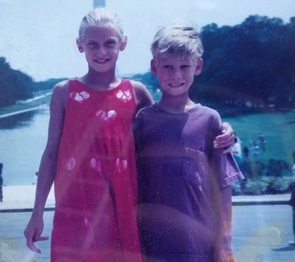 Austen Kroll and his sister Kyle standing with arms around each other.
