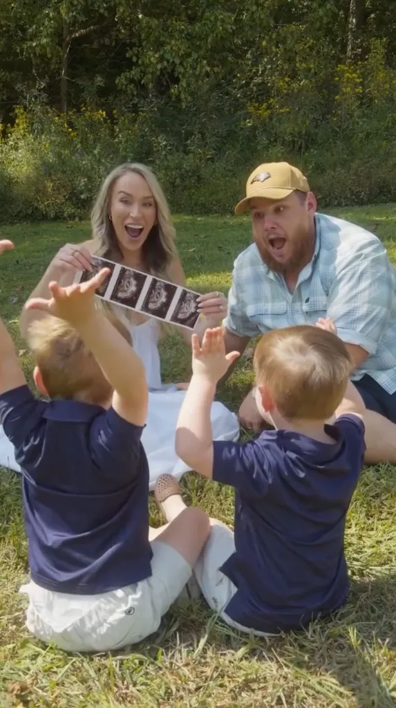 Nicole and Luke Combs announcing their third pregnancy with two children raising their arms.