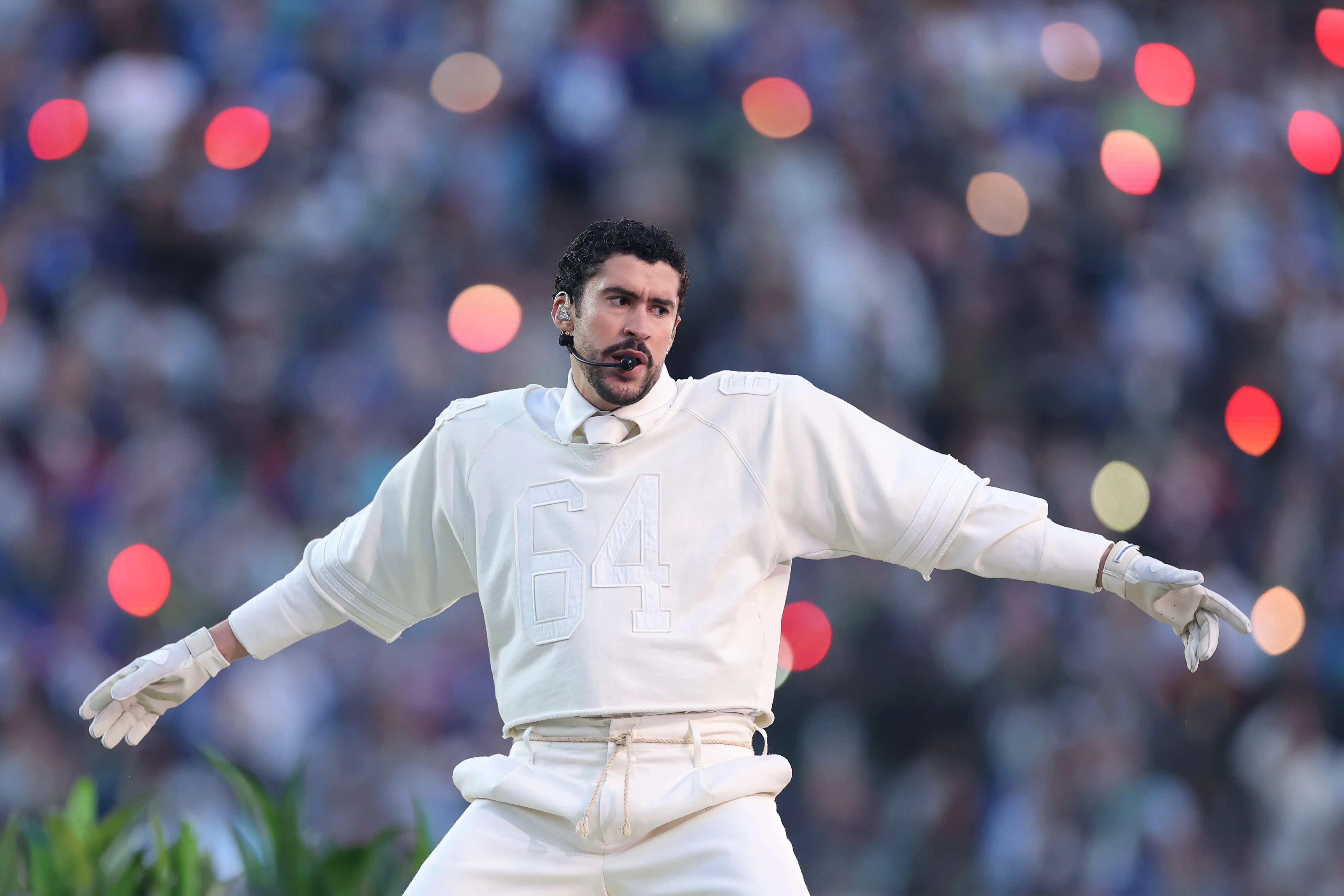Bad Bunny performing onstage during the Apple Music Super Bowl LX Halftime Show.