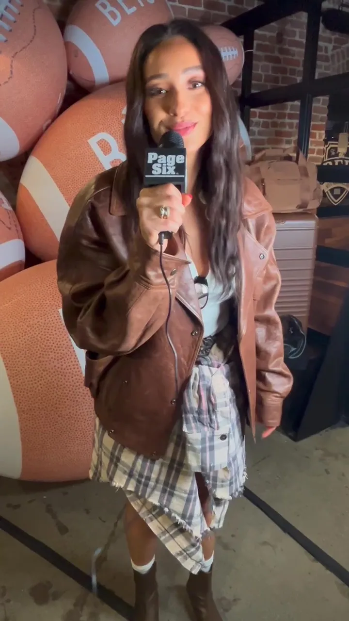 shay mtchell holding a 