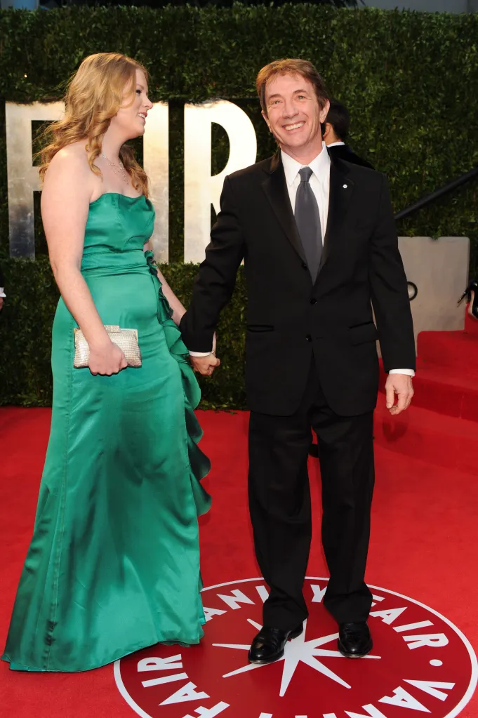 Katherine Short and Martin Short holding hands at the Vanity Fair Oscar Party.