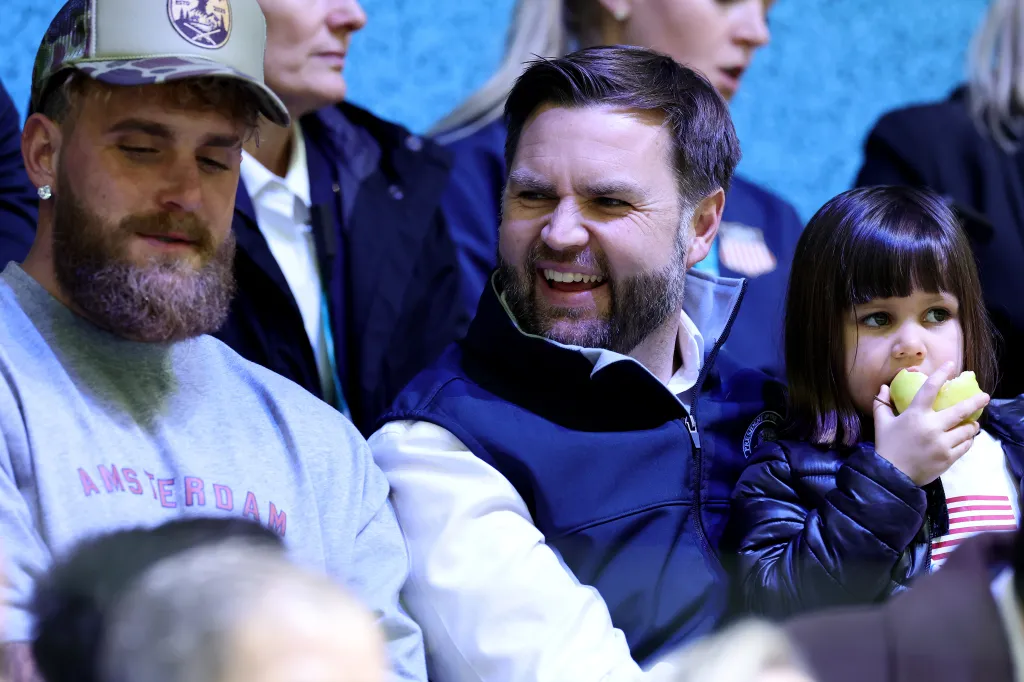 Boxer Jake Paul, US Vice President JD Vance, and his daughter Mirabel in the stands at the Milano Cortina 2026 Winter Olympics.