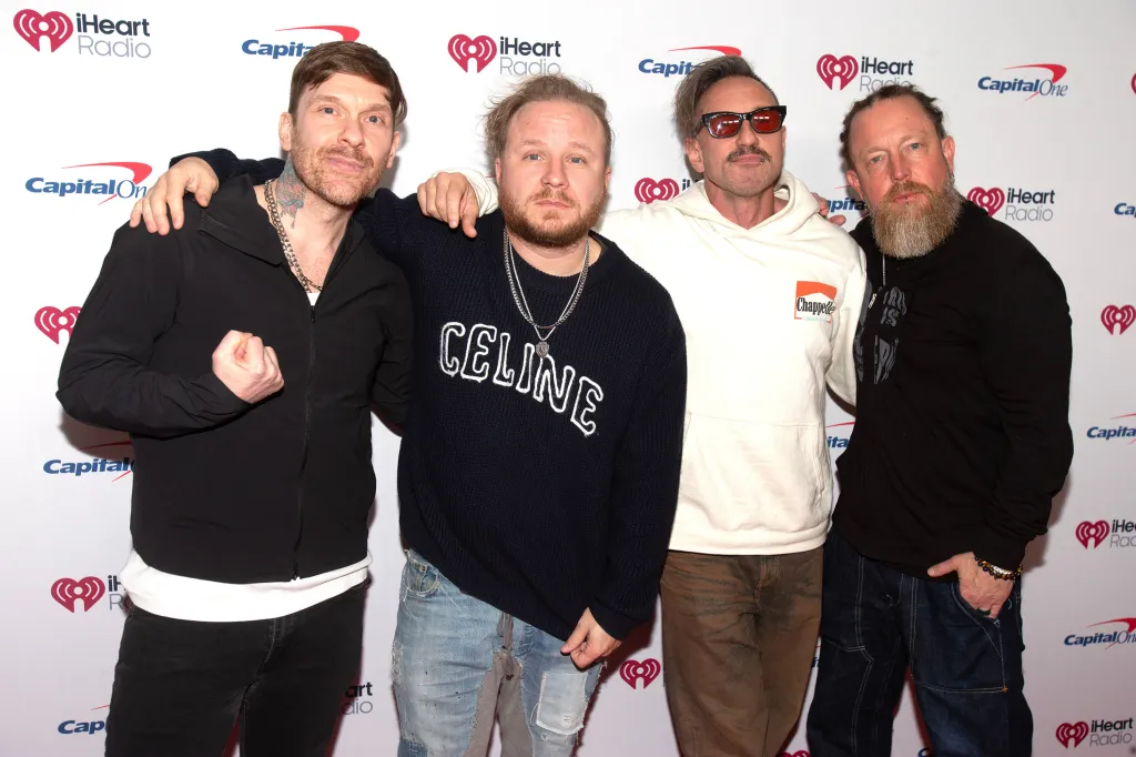 Shinedown members Brent Smith, Zach Myers, Eric Bass and Barry Kerch at iHeartRadio Jingle Ball in Washington, DC, on Dec. 16, 2025.