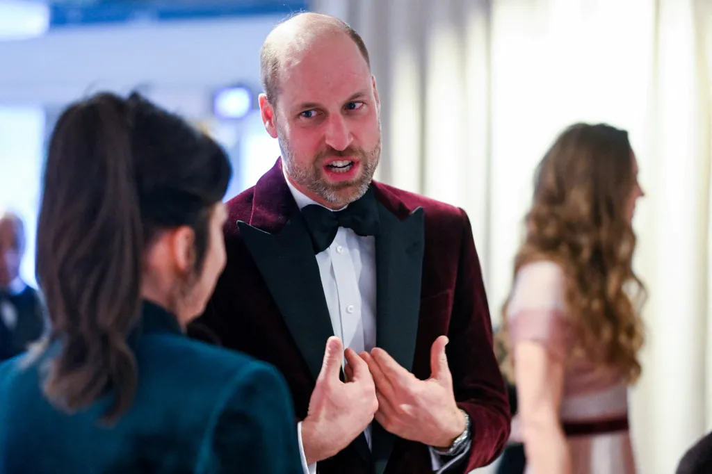 Prince William speaks with Jane Millichip, CEO of BAFTA, at an awards ceremony.