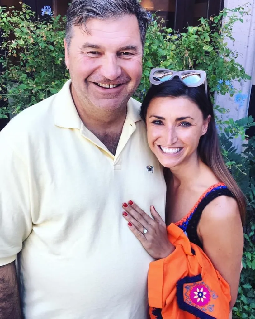 Bronwyn Newport and Todd Bradley smiling together.