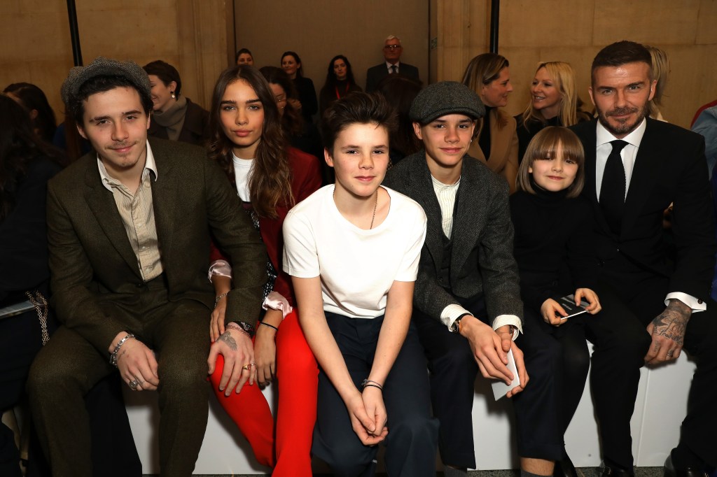 Brooklyn Beckham, Hana Cross, Cruz Beckham, Romeo Beckham, Harper Beckham and David Beckham attends the Victoria Beckham show during London Fashion Week February 2019 on February 17, 2019 in London, England. 