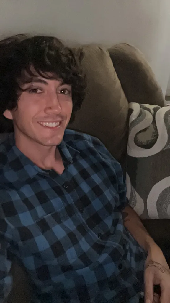 Conor Lopez, 23-year-old California drunk driving victim, smiling in a blue plaid shirt.