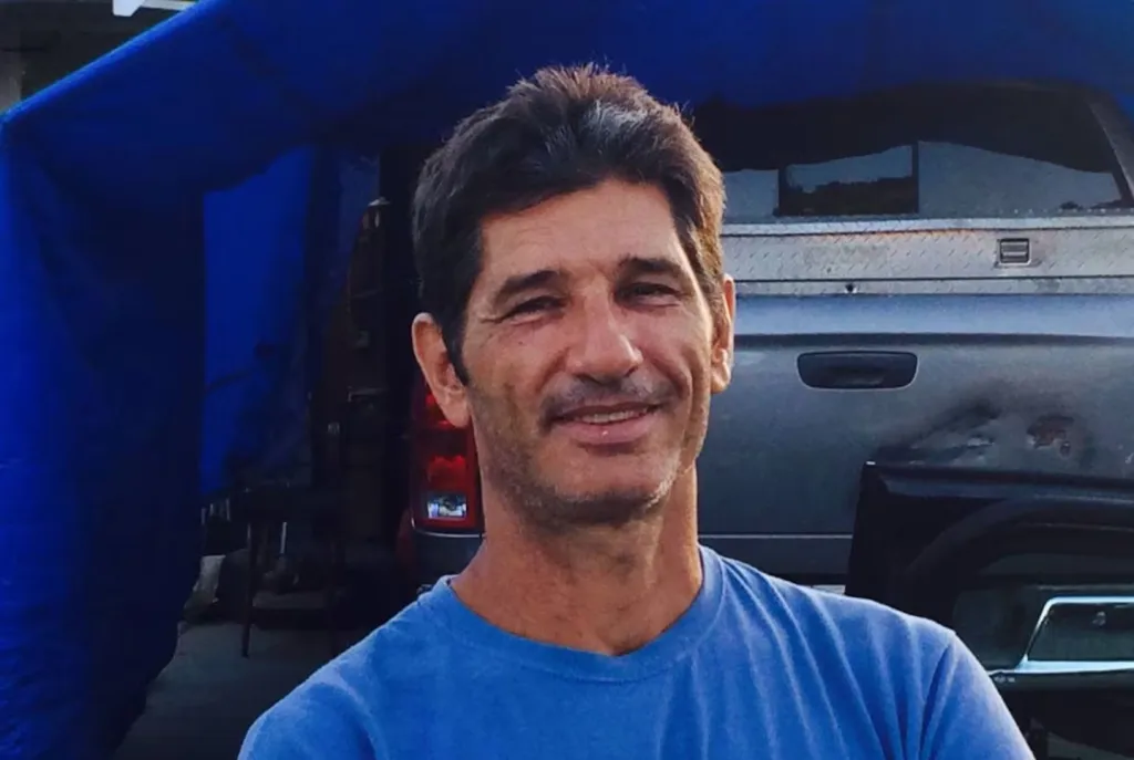 Headshot of Kurt Van Dyke smiling.