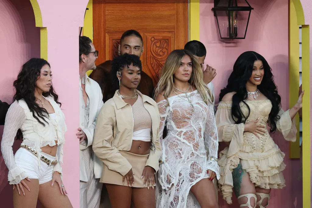 Karol G and Cardi B perform onstage during the Apple Music Super Bowl LX Halftime Show.