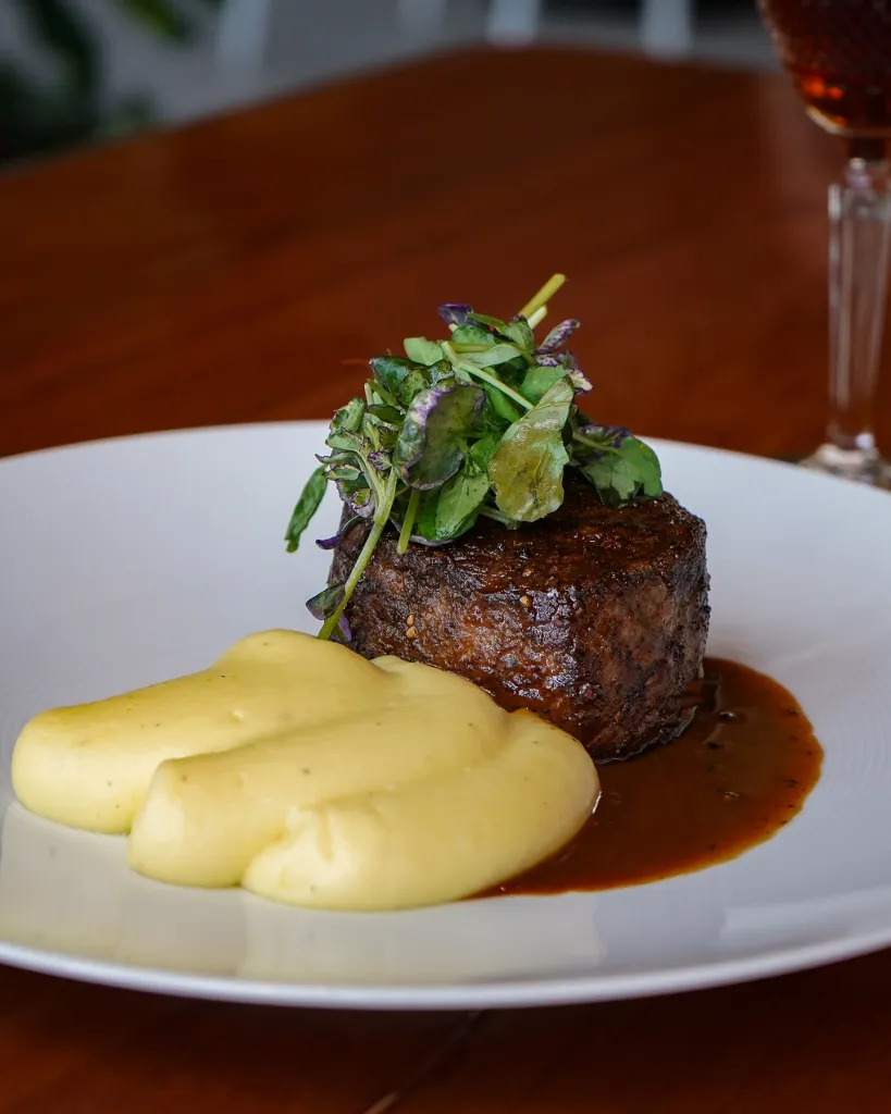 Carver Steakhouse's fillet mignon with a side of mashed potatoes and gravy.