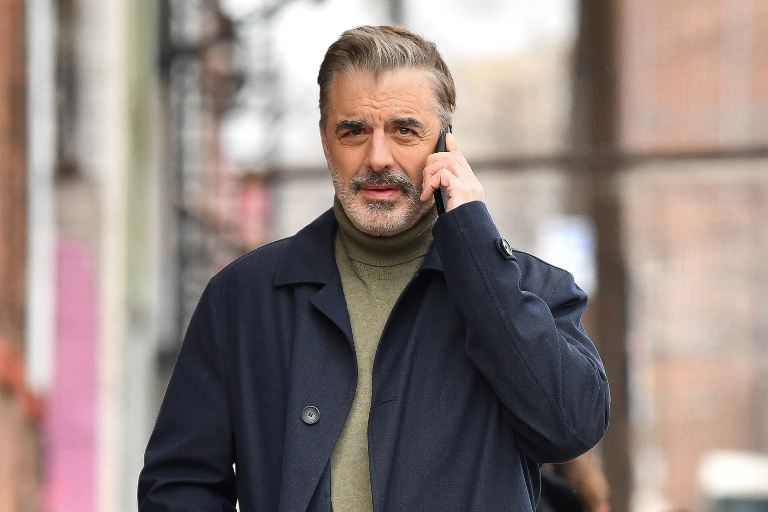 Chris Noth on the set of 'Equalizer' talking on the phone.