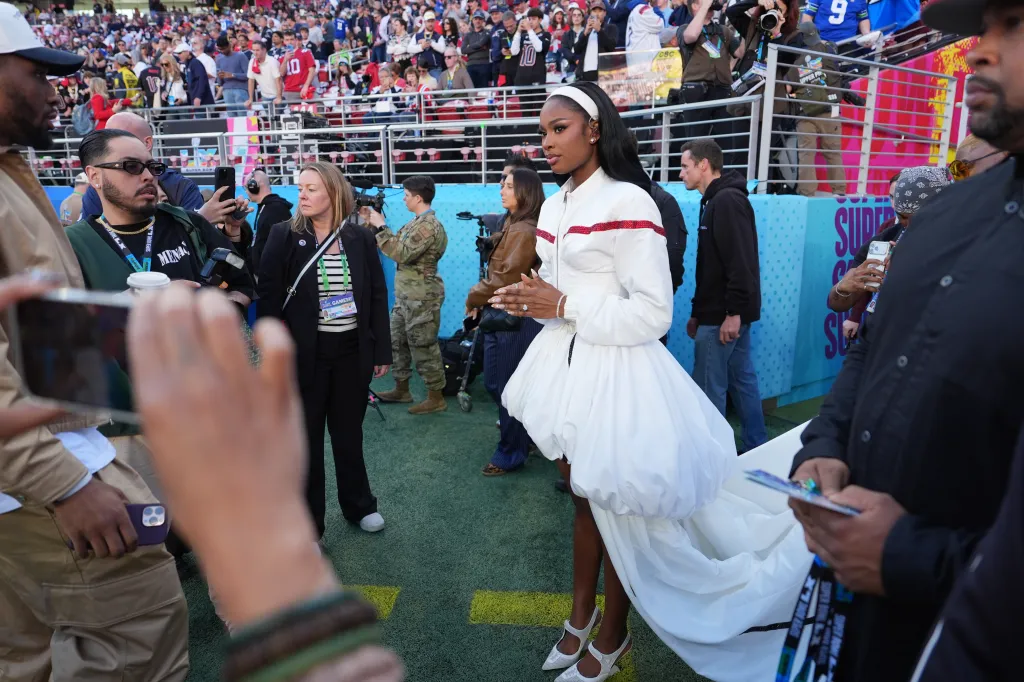 Coco Jones appears before Super Bowl LX.