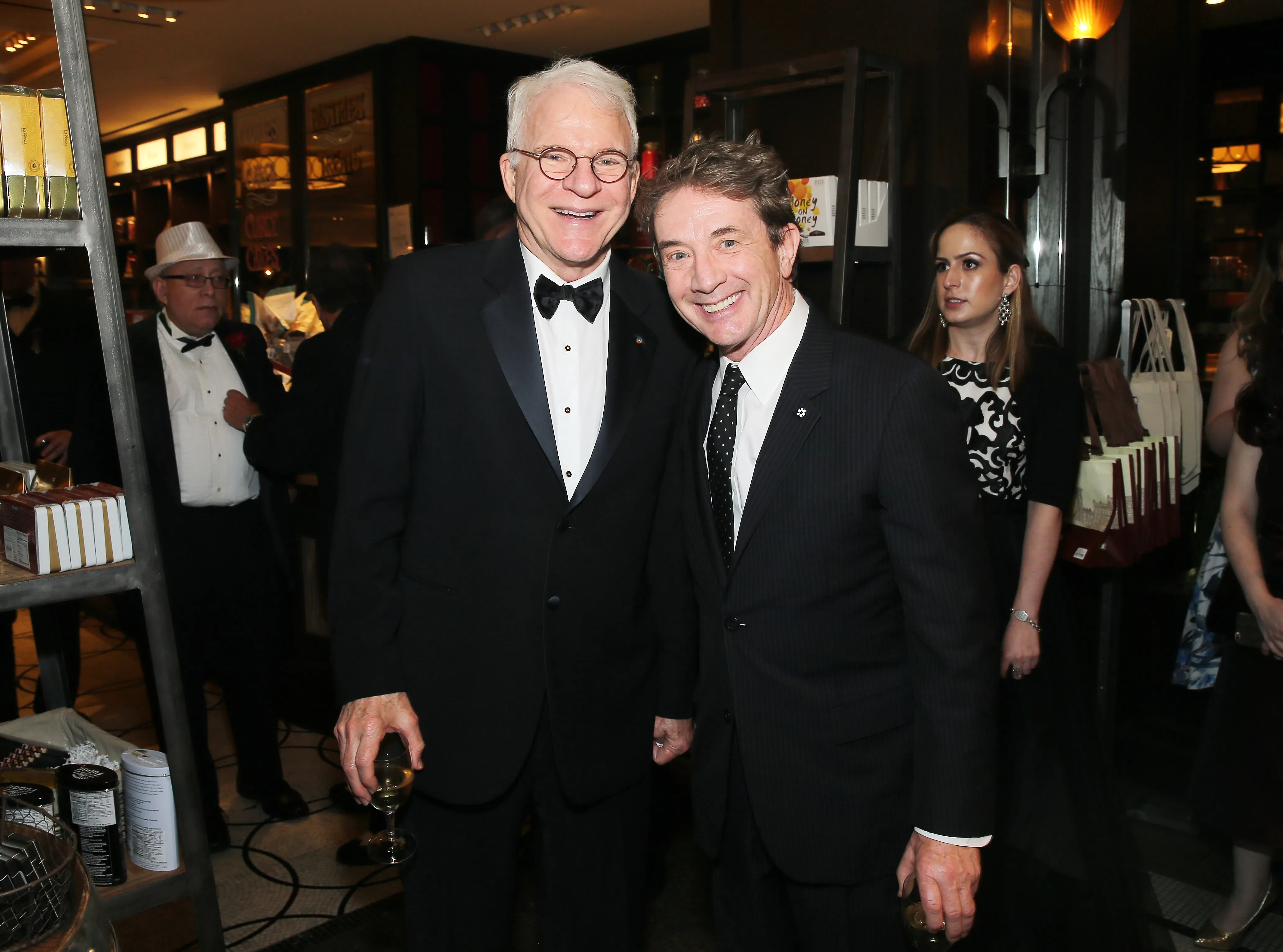 Comedians Steve Martin and Martin Short smile while posing for a photo.