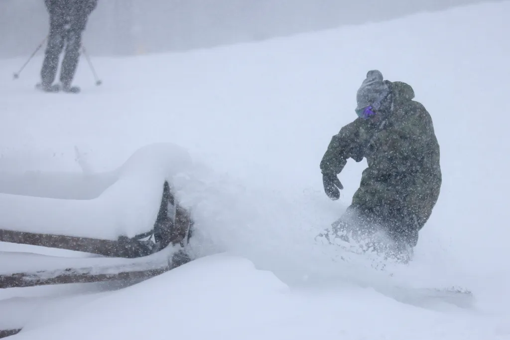 John Goggin snowboarding at Northstar California Resort.