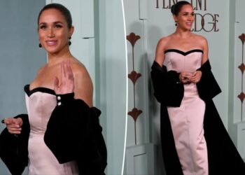 Meghan Markle goes old Hollywood glam during solo outing at charity gala