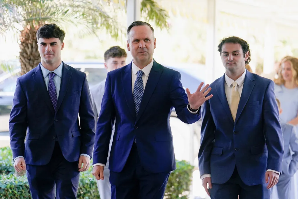 Dan Scavino, White House deputy chief of staff, waves as he arrives at his wedding.