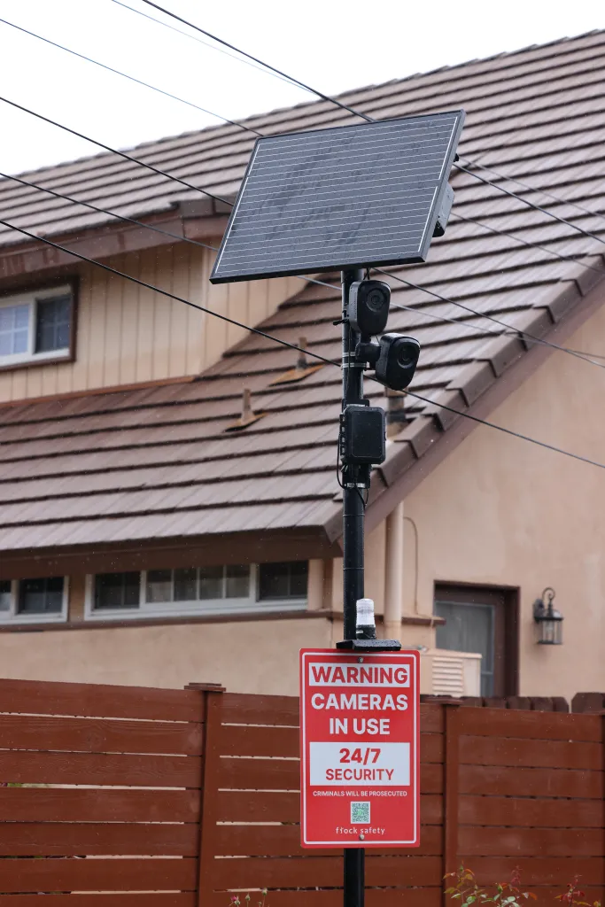 A red warning sign announcing