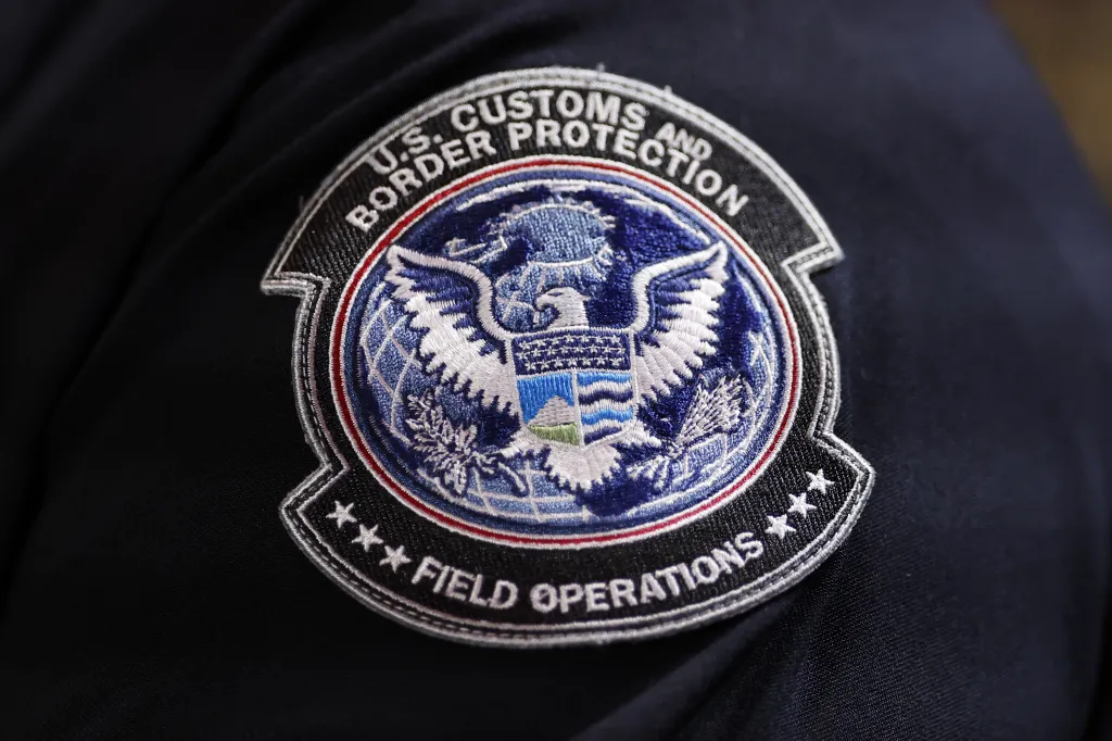 Close-up of the U.S. Customs and Border Protection Field Operations patch on Eric Batt's uniform.