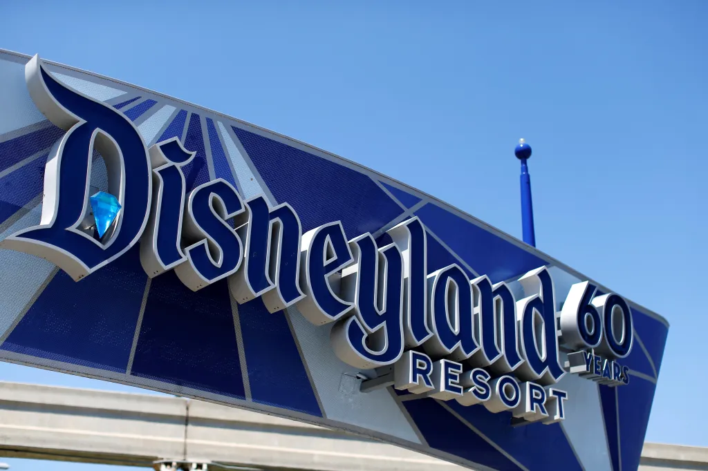 The Disneyland logo in blue and white.