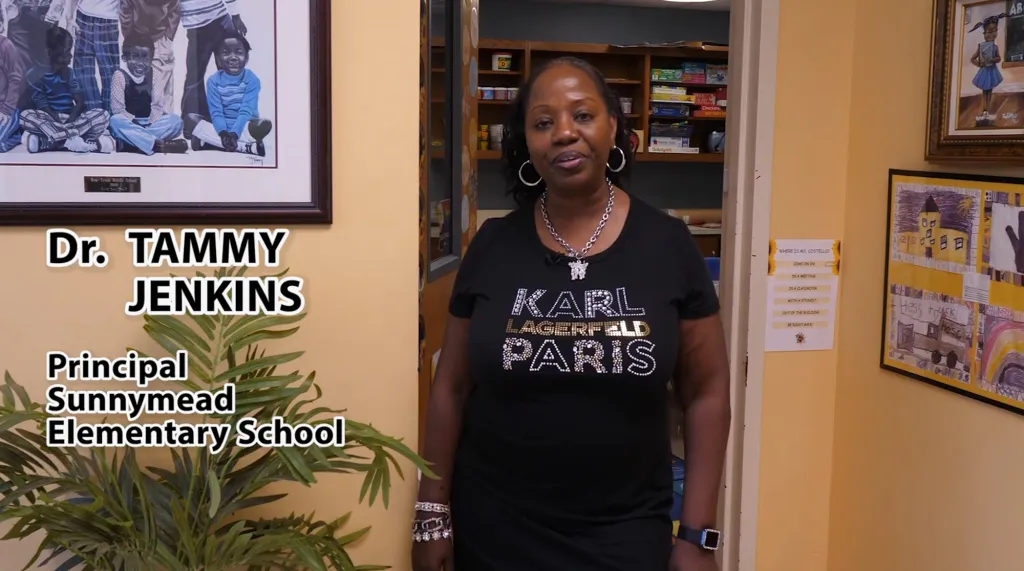 Dr. Tammy Jenkins, Principal of Sunnymead Elementary School, stands in a doorway.