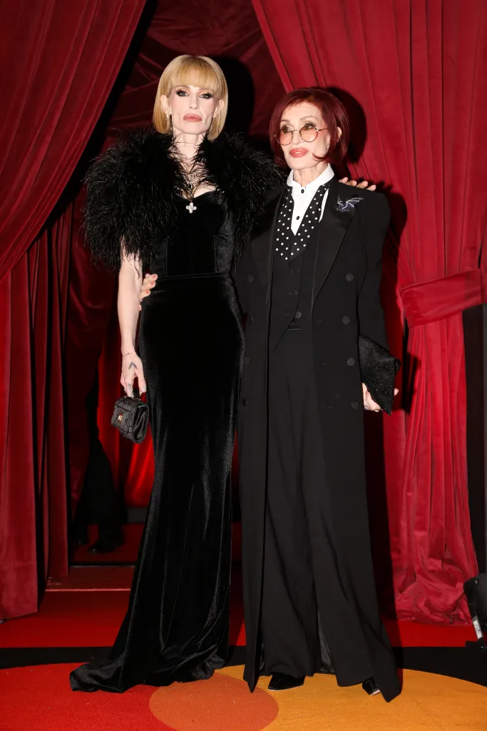 Kelly Osbourne and Sharon Osbourne pose on the red carpet at The BRIT Awards 2026.
