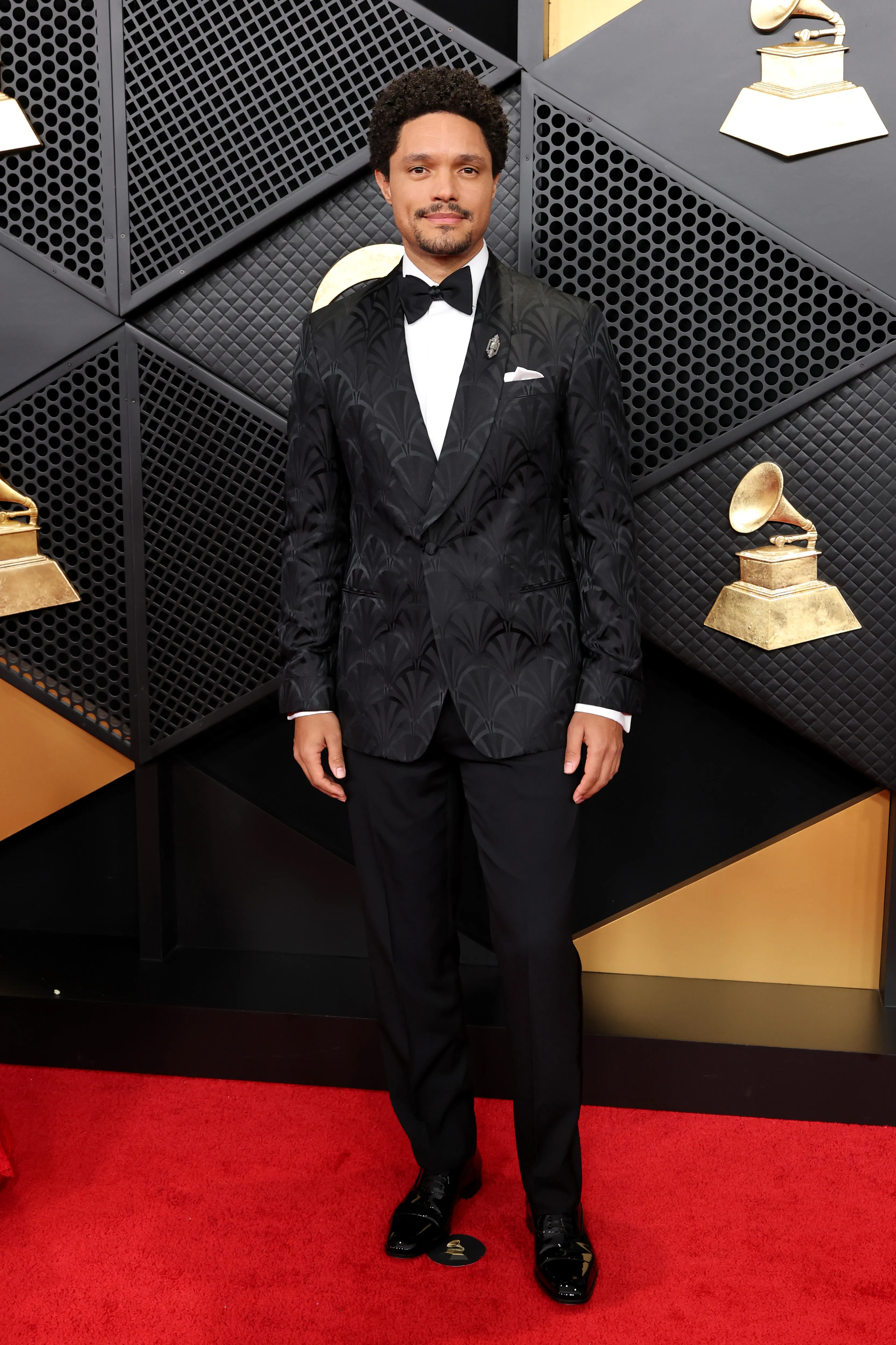 Trevor Noah on the red carpet of the Grammys