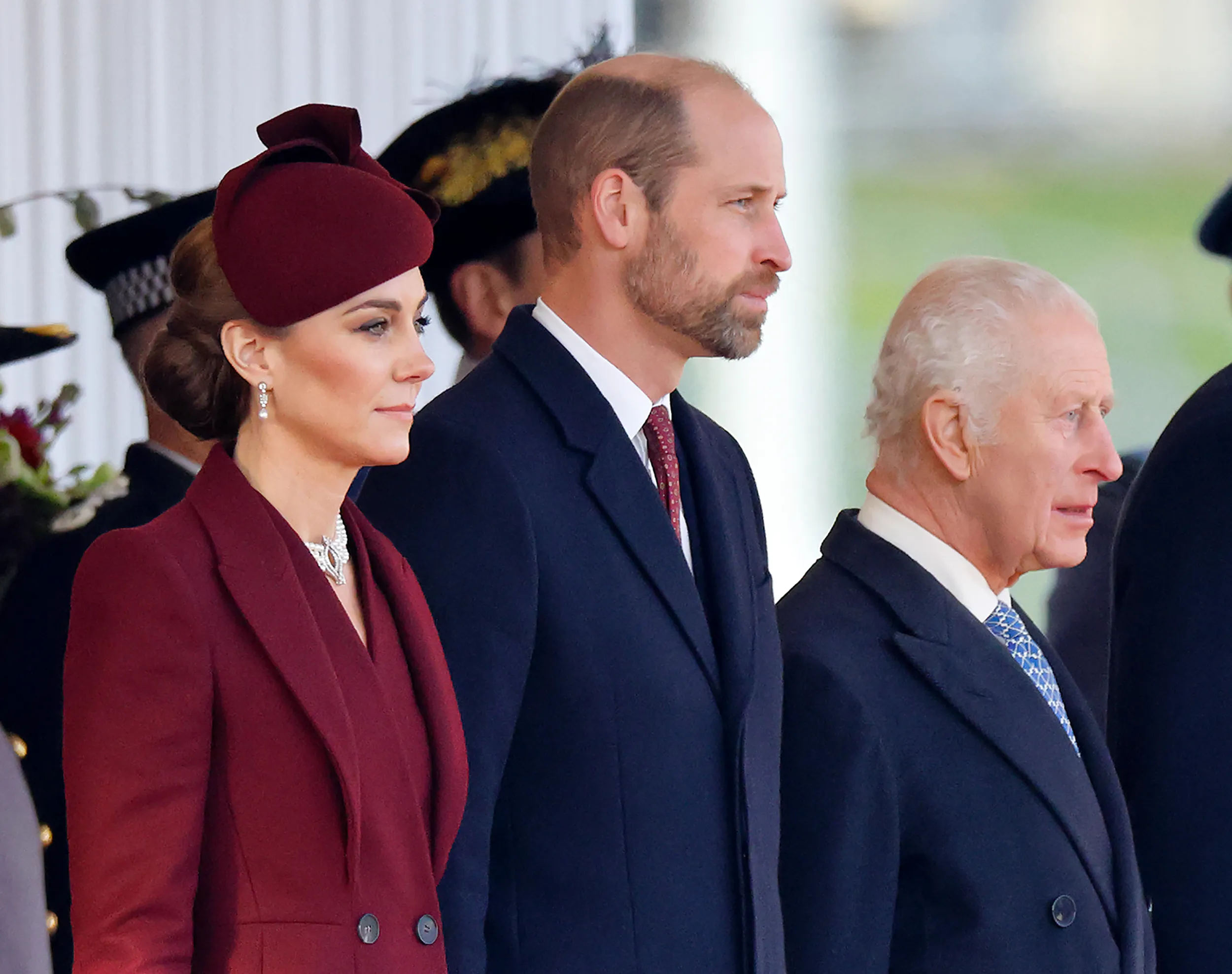 Catherine, Princess of Wales, Prince William, and King Charles III attend a ceremonial welcome.