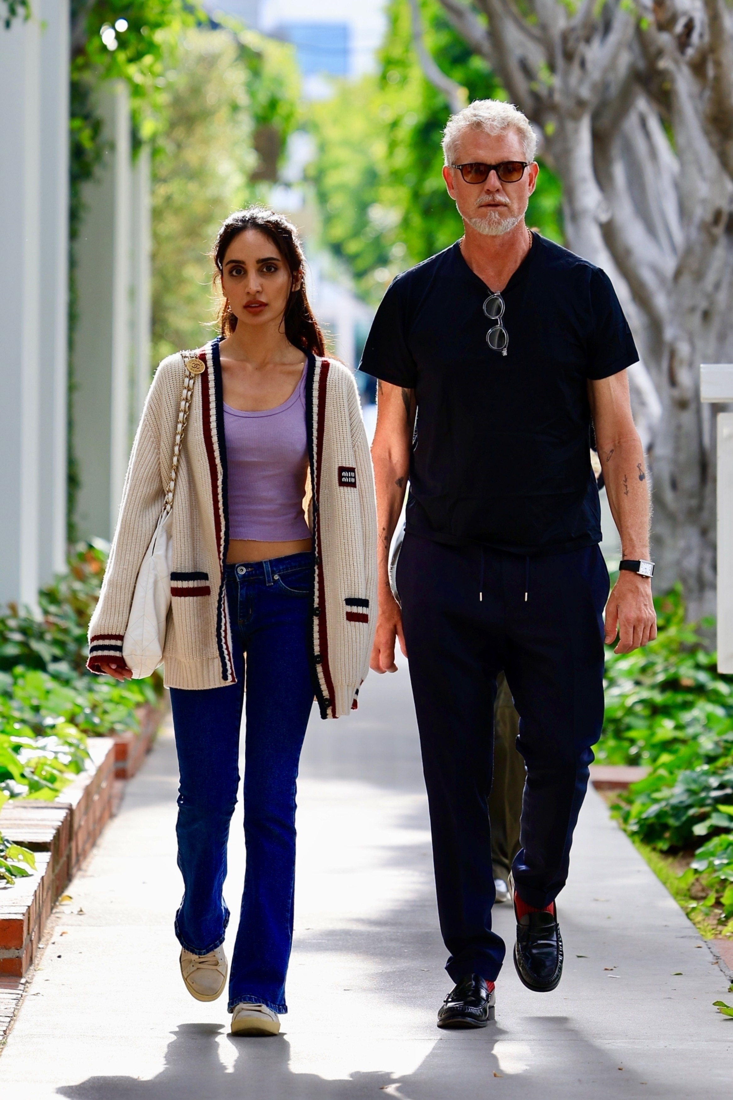 Eric Dane and Priya Jain walking in Beverly Hills.