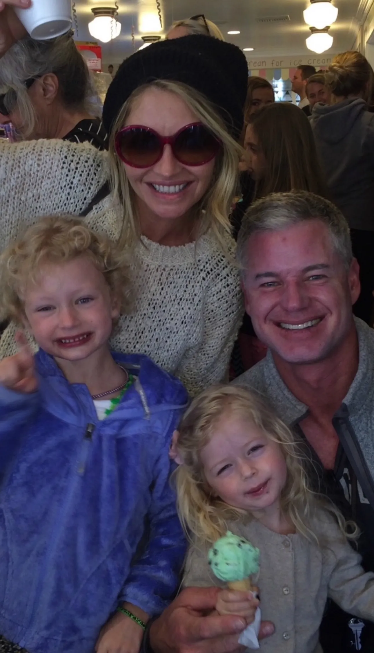 Dane, pictured in a family photo above, welcomed daughters Billie and Georgia with Gayheart.