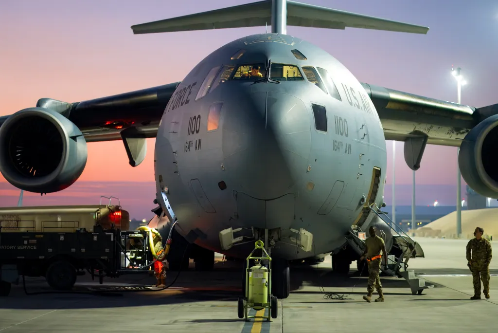 A C-17 Globemaster III on the apron at Al Udeid Air Base, Qatar, being refueled.