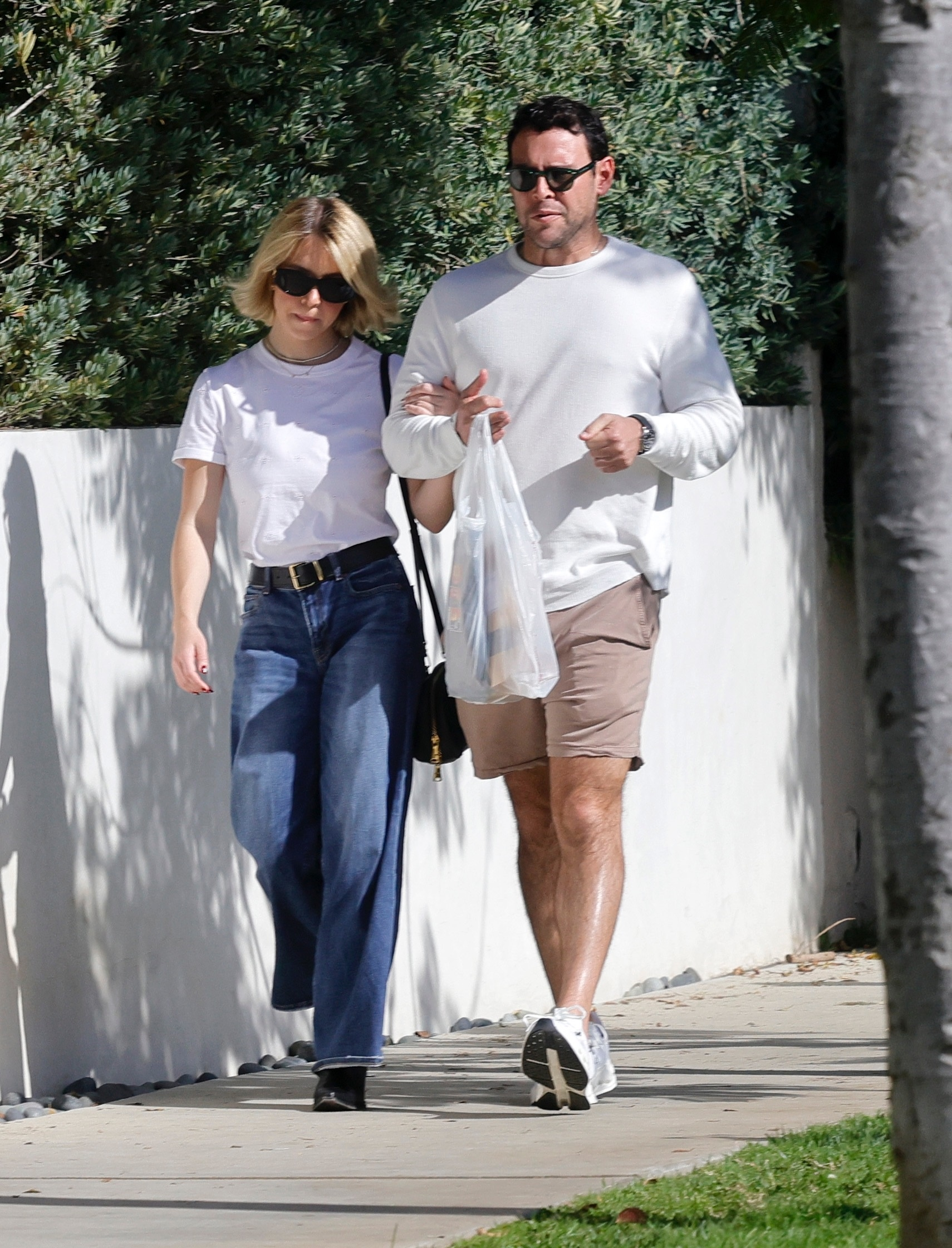 Sydney Sweeney and Scooter Braun walking together in Brentwood.