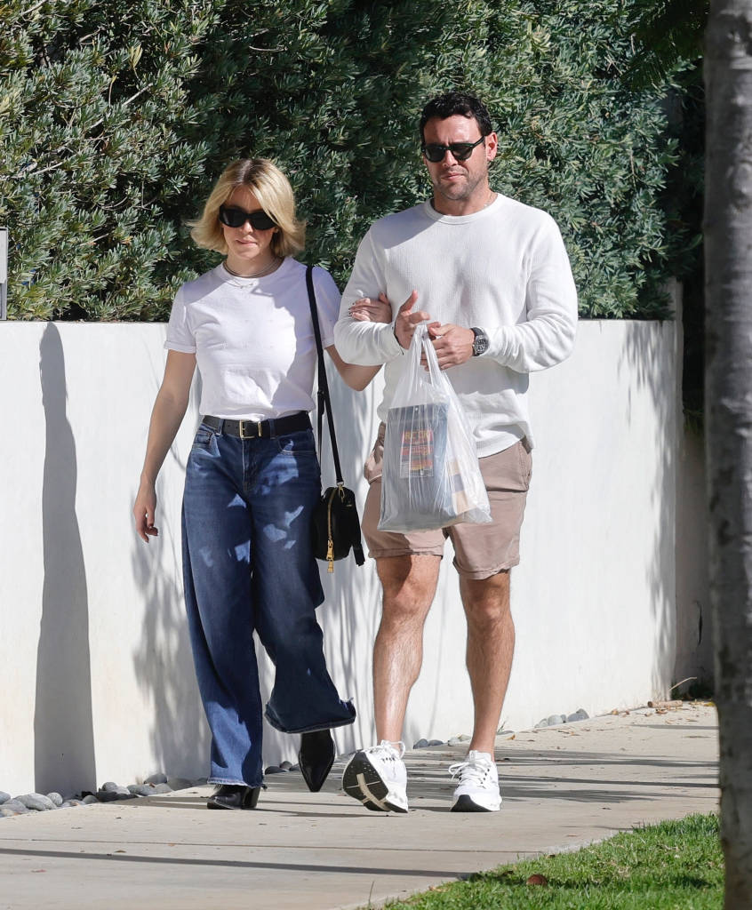 Sydney Sweeney and Scooter Braun walking together in Brentwood, California.