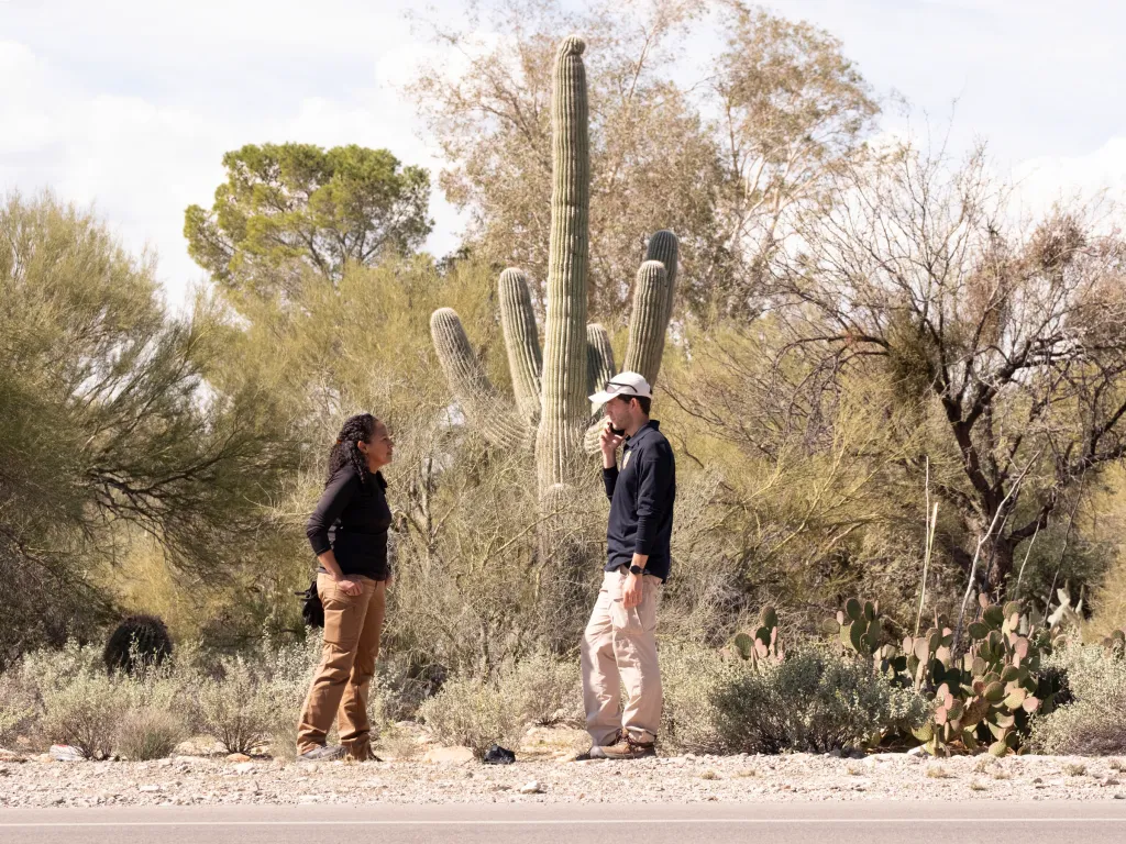 Two FBI officers searching North Campbell Ave, near Nancy Guthrie’s home in Tucson, Arizona.