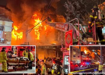 Raging 4-alarm NYC house fire injures 2 firefighters, 7 people — including 1 critically