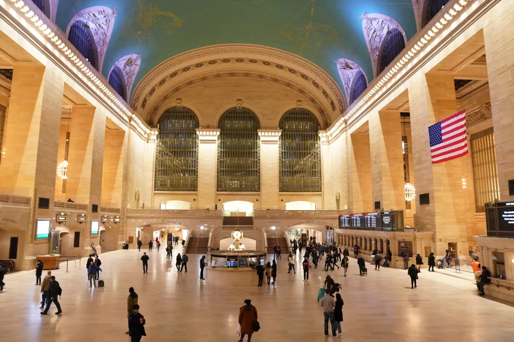 A general view of the interior of Grand Central Terminal in New York City with people walking across the main concourse.