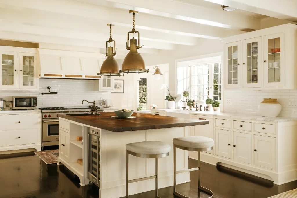 The home is anchored by a white chef's kitchen
