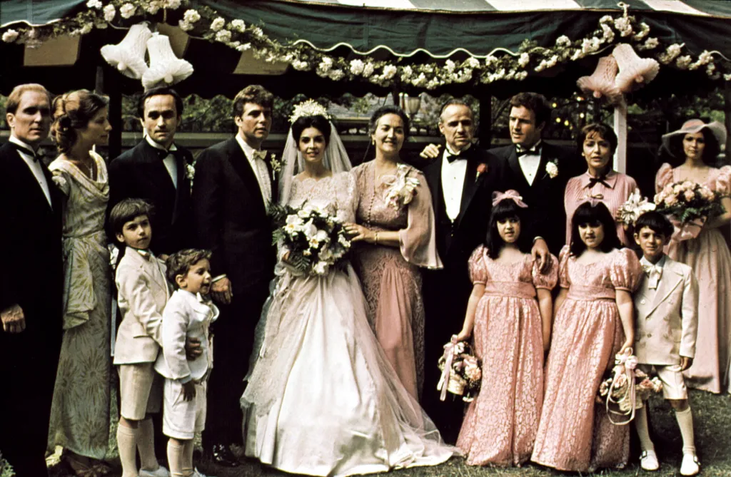 Cast members of The Godfather at a wedding.