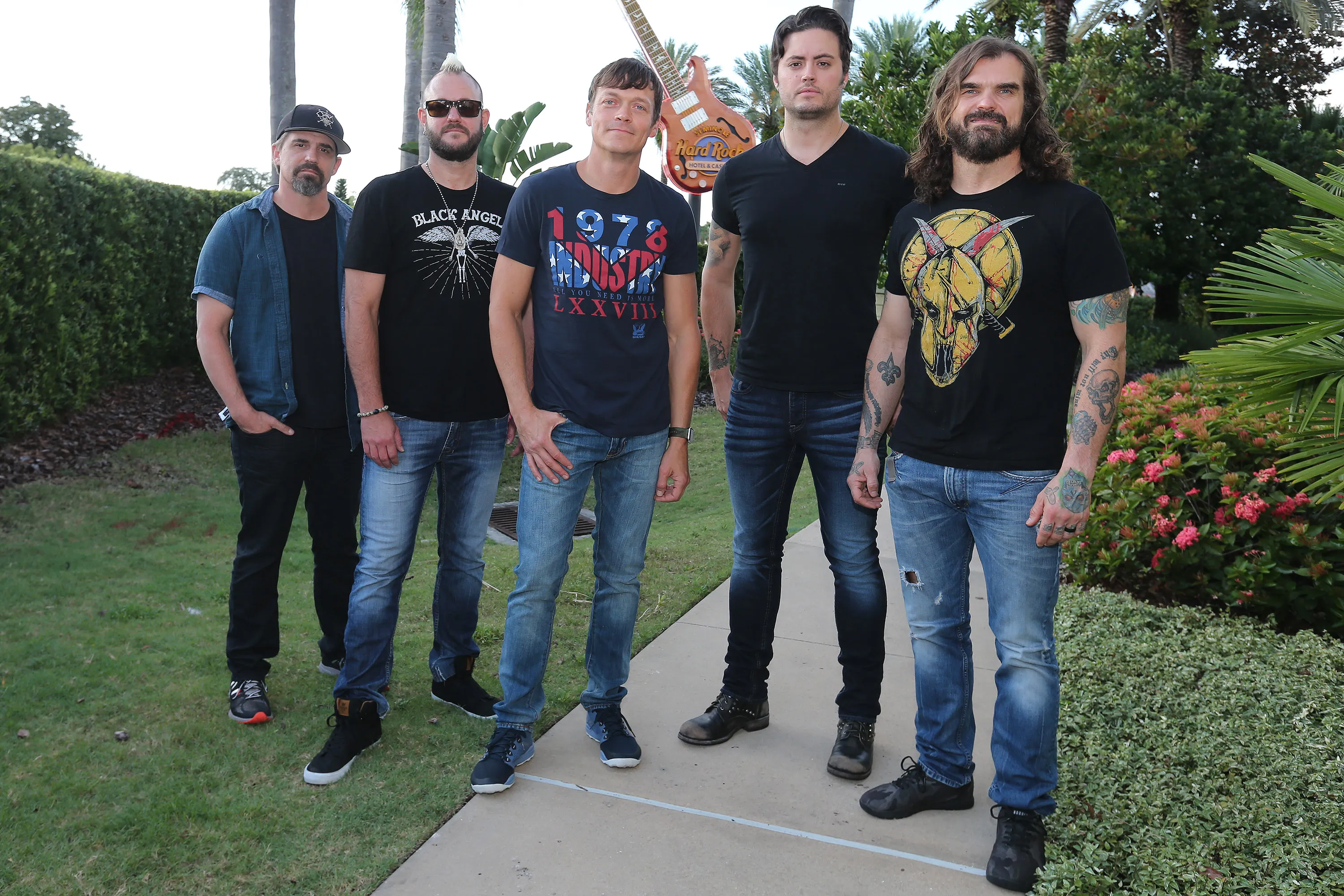 Greg Upchurch, Chris Henderson, Brad Arnold, Justin Biltonen and Chet Roberts of 3 Doors Down pose for photos.